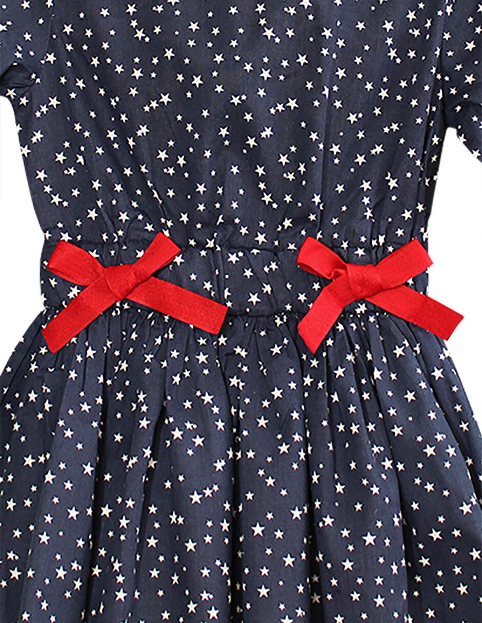 Vestido Carana manga larga con moño para niña